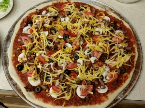 My fave toppings: Mushrooms, Peppers, Black Olives,  Scallions, Bacon,  Sausage,  Tomatoes,  Pepper Jack Cheese and, of course, Mozzarella! Hold your horses! Where's the Pepperoni?